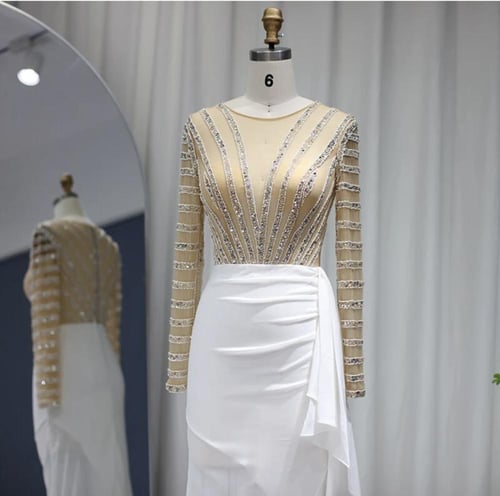 فستان عصري أبيض شيفون مع تطريز يدوي من سمارا بوتيك...