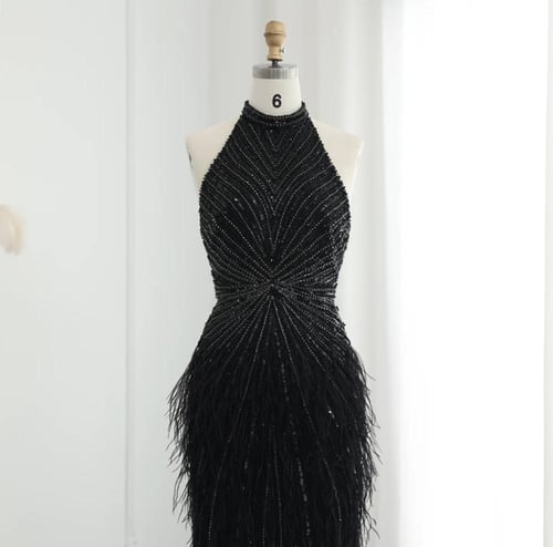 فستان سهرة فاخر ريش مع تطريز يدوي من سمارا بوتيك-E...