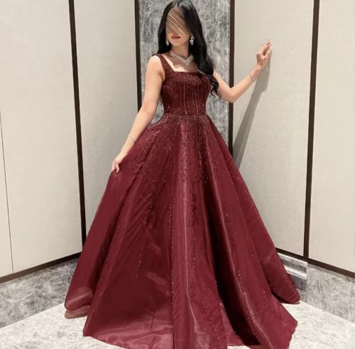 Elegant engagement dress in a soft burgundy color from Samara Boutique - P98