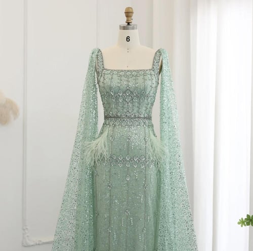 فستان سهرة راقي ميدي تطريز يدوي ريش من سمارا بوتيك...