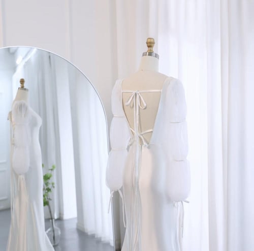 فستان العيد أوف وايت حورية البحر وأكمام طويلة