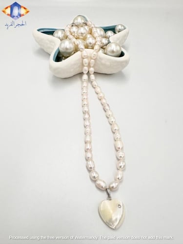 عقد لؤلؤ المياه العذبه الطبيعي المميز مع تعليقه قل...