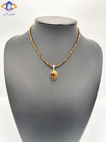 عقد وتعليقه حجر عين النمر الكريم الطبيعي .