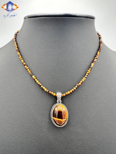 عقد وتعليقه حجر عين النمر الكريم الطبيعي .