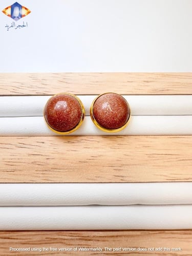 حلق من حجر الرمل الذهبي الطبيعي الكريم .