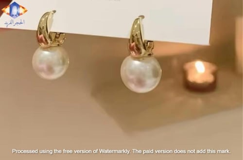 حلق ذهبي مرصع باللؤلؤ الطبيعي