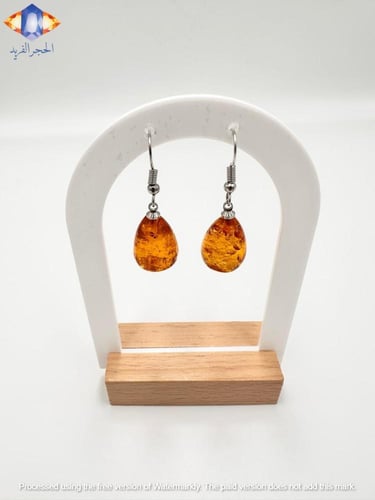 حلق من العنبر العسلي الطبيعي .