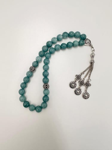 سبحة حجر الأكوامارين الطبيعي الكريم .