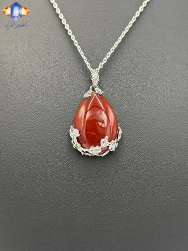 تعليقه حجرالعقيق الأحمر الطبيعي الكريم.