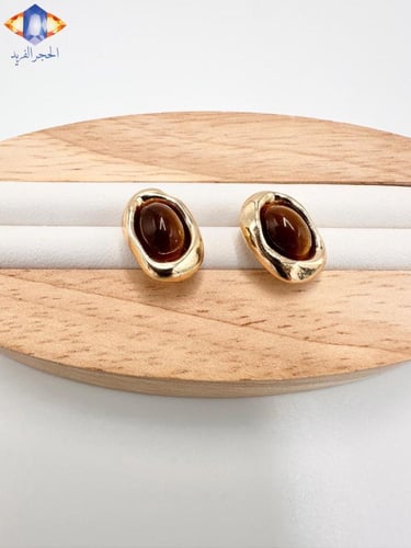 حلق من حجر عين النمر الأصفر الطبيعي الكريم .