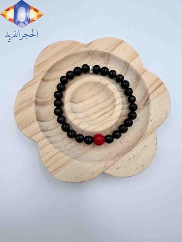 سوار حجر الأونكس الطبيعي الكريم يتوسطه حجر المرجان...