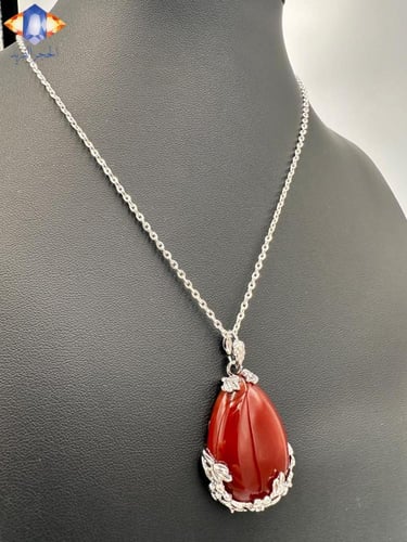 تعليقه حجرالعقيق الأحمر الطبيعي الكريم.