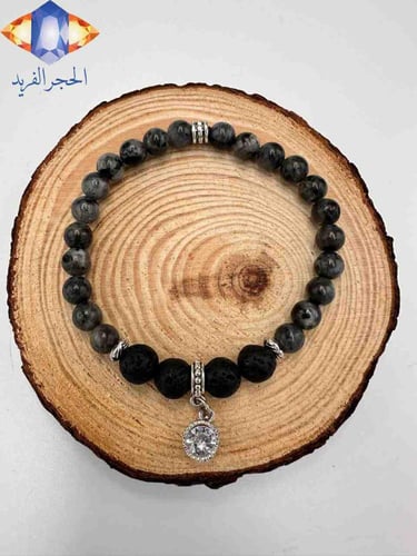 سوار من حجر البركاني الاسود الطبيعي وحجر الطاووس ا...