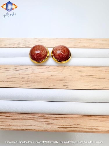 حلق من حجر الرمل الذهبي الطبيعي الكريم .