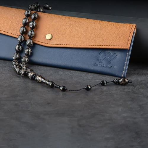 سبحه فاخرة خرز أسود ونقشات فضية ناعمة