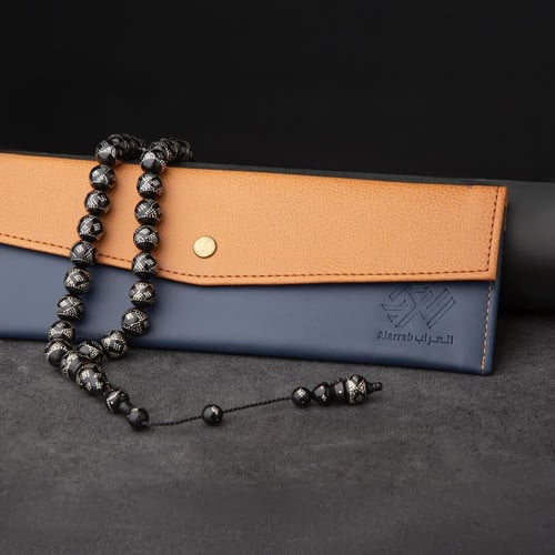 سبحة كوك فضه 12 ملي أسود بنقشات فضية