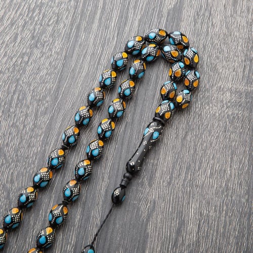 سبحه خرز اسود منقوش بالأصفر والسماوي