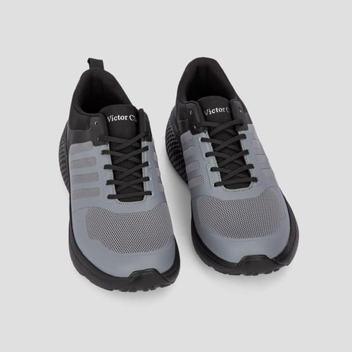 حذاء رياضة مميز من فيكتور كلارك بألوان الأسود والر...