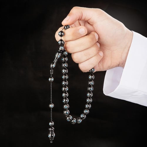 سبحه سوداء سادة مع نقاط زرقاء