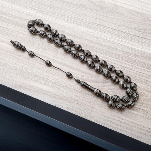 سبحه خرز أسود بخطوط فضية