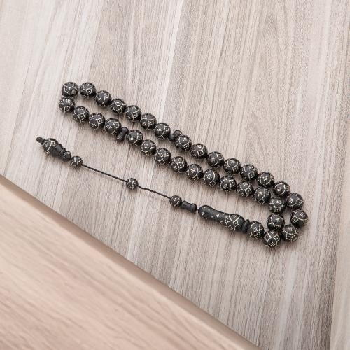 سبحه كوك فضه 12 ملي أسود بنقشة هادئة