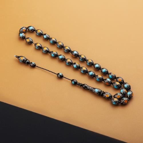 سبحه رائعة من اللون الأسود بنقوش أزرق وبرتقالي