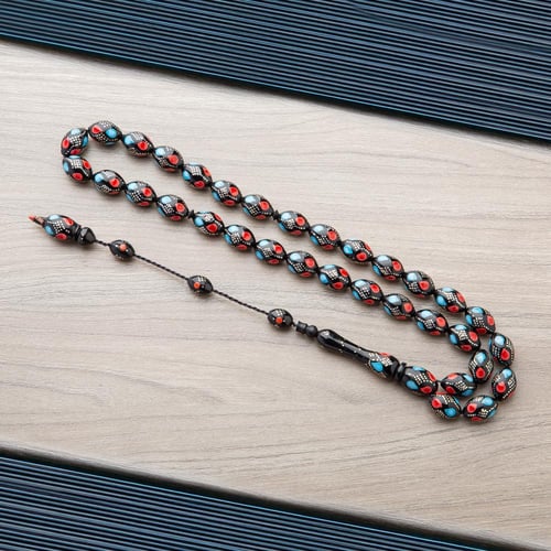 سبحه فاخرة من الخرز الأسود بنقشات ملونة