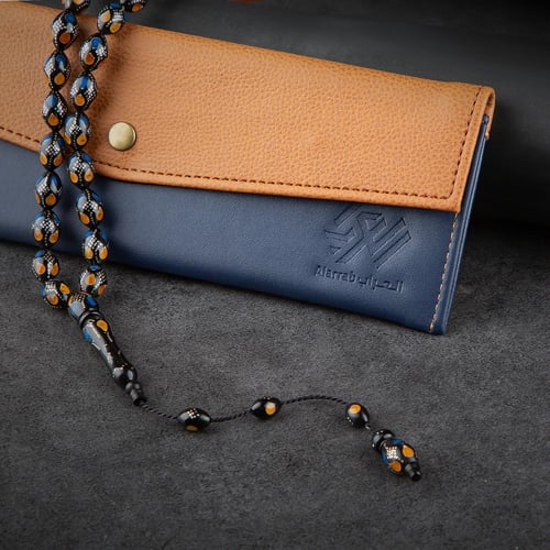 سبحه خزر أسود بنقشات أصفر وأزرق