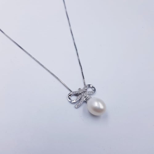 طقم لؤلؤ زراعي وفضة فخم