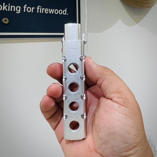 مقبض ترنجيا لرفع الأواني الساخنة