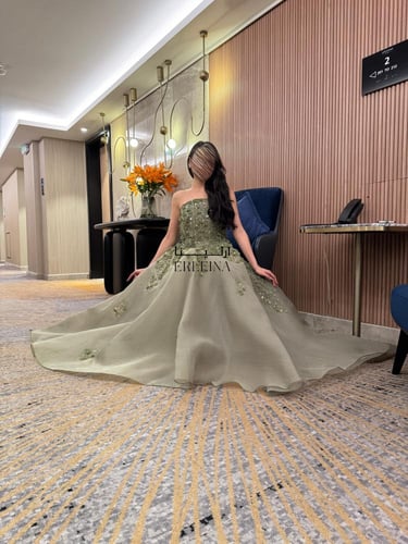 فستان رواء زيتي