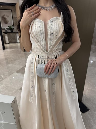 فستان نردين كريمي