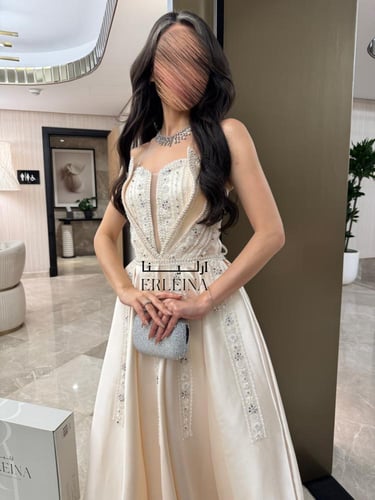 فستان نردين كريمي