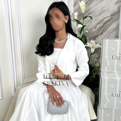 فستان حوراء ابيض