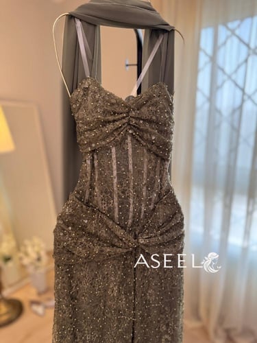 فستان زيتي سهرة مطرز