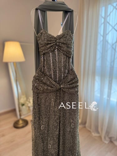 فستان زيتي سهرة مطرز