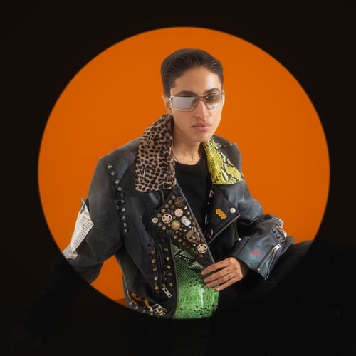 Black leather jacket with a diverse mix of genuine...