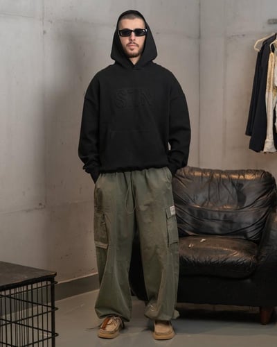 Black hoodie with SZN logo