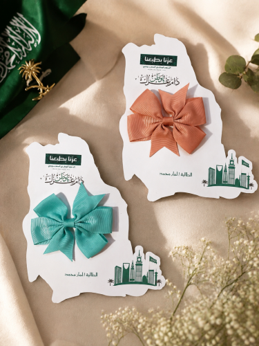 Bags with bow-shaped decorations