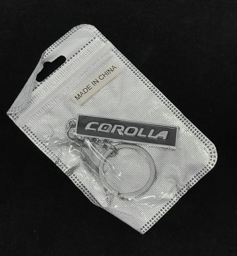 ميدالية معدنية كورولا اسود (صغير)