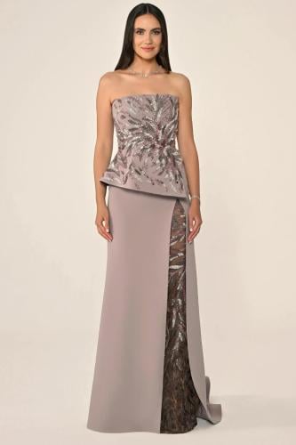 A long dress made of crepe fabric with embroidered tulle on the side