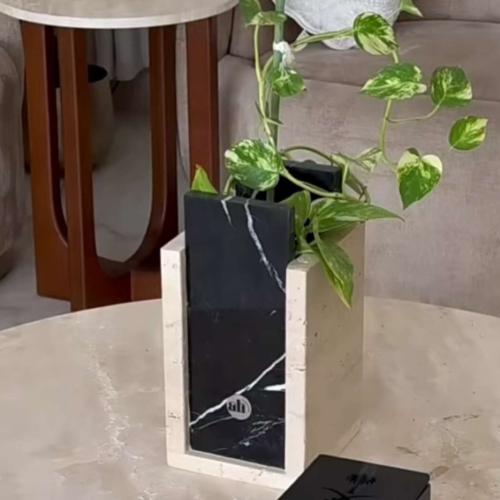 A vase of travertine stone and marble
