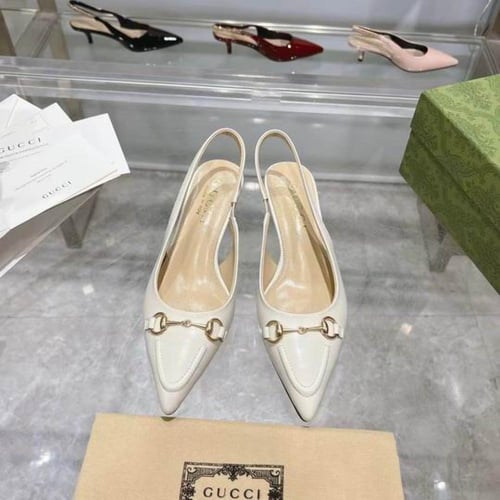 قوتشي كعب عالي أبيض