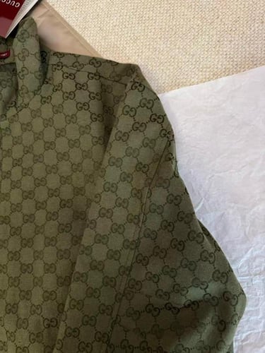 جاكيت غوتشي زيتي