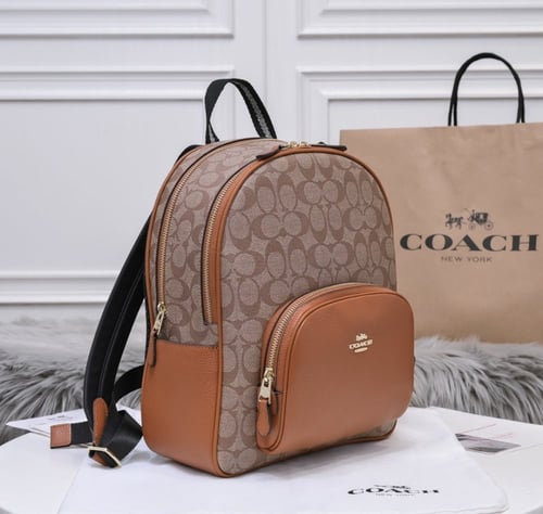 حقيبة ظهر كوتش بني جملي