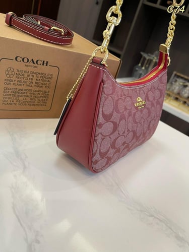 شنطة كوتش عنابي راقية