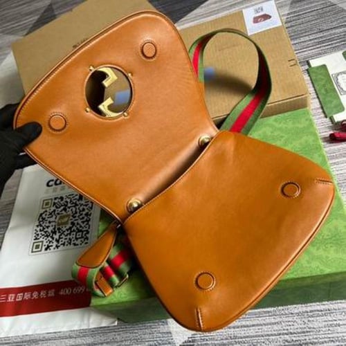 شنطة قوتشي بني