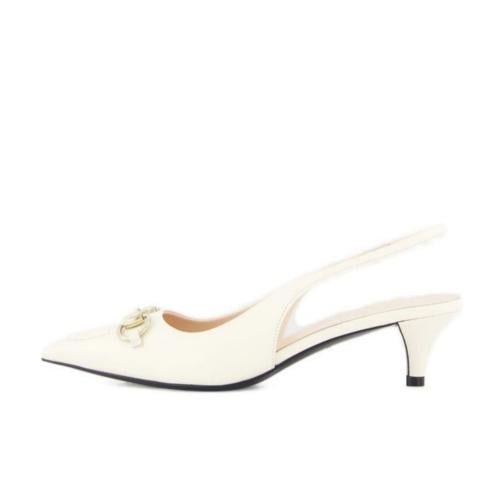 قوتشي كعب عالي أبيض