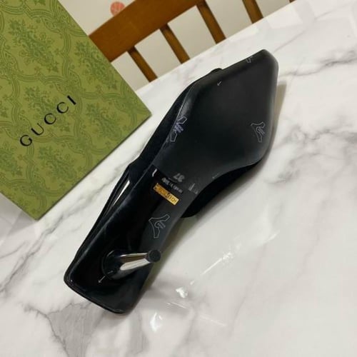 قوتشي كعب عالي أسود و أبيض