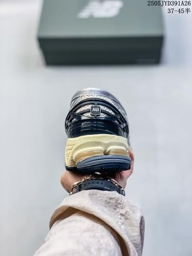 نيو بالانس 1906 رمادي ترند